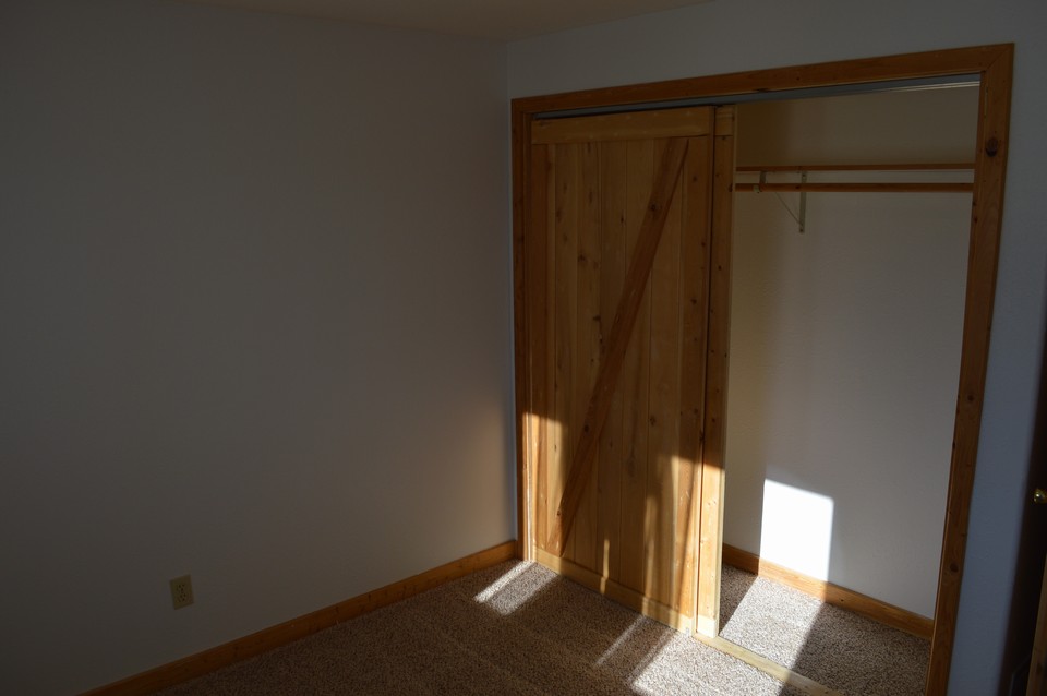 secondary bedroom secondary bedrooms have wood doors in true colorado style.