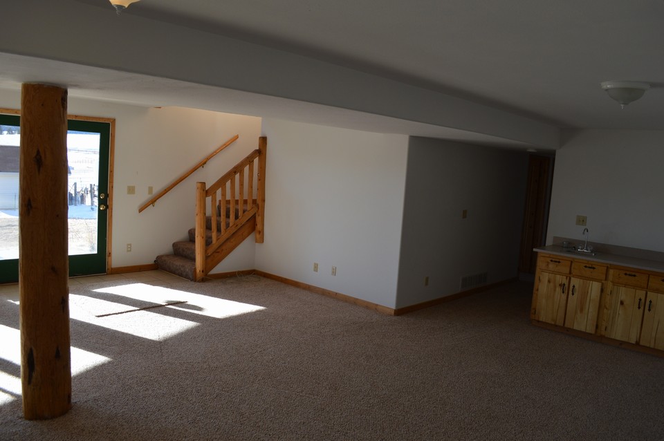 family room finished family room with walk-out is great for game room, entertaining, or privacy.
