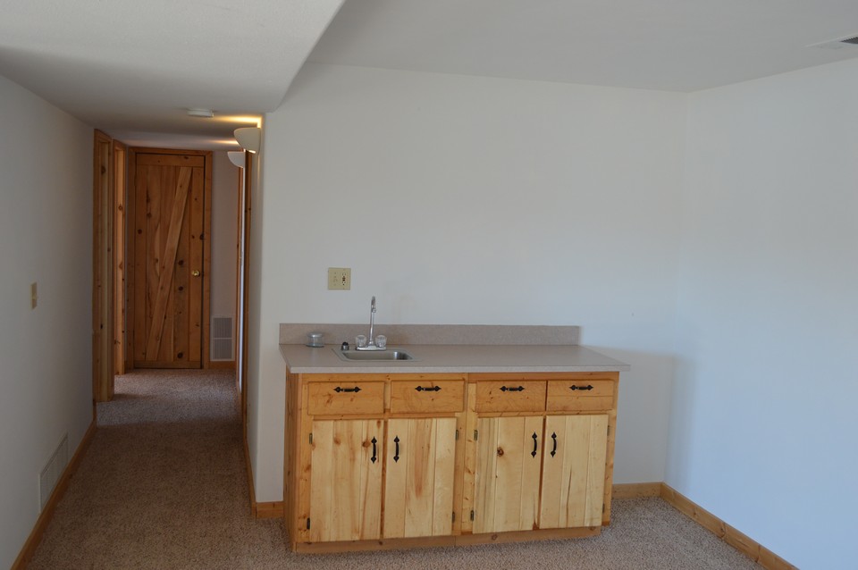 wet bar added bonus of lower level is a wet bar with both counter and cabinet space.