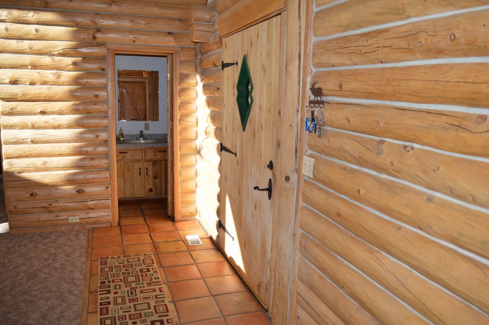 tiled entry tiled entry has warm, mountain welcome.